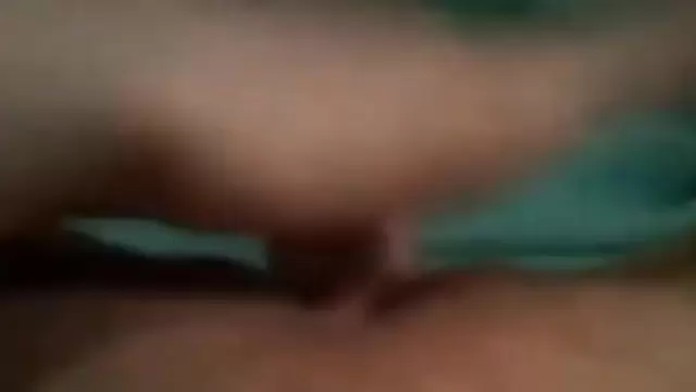 Asian girl fingering her pussy